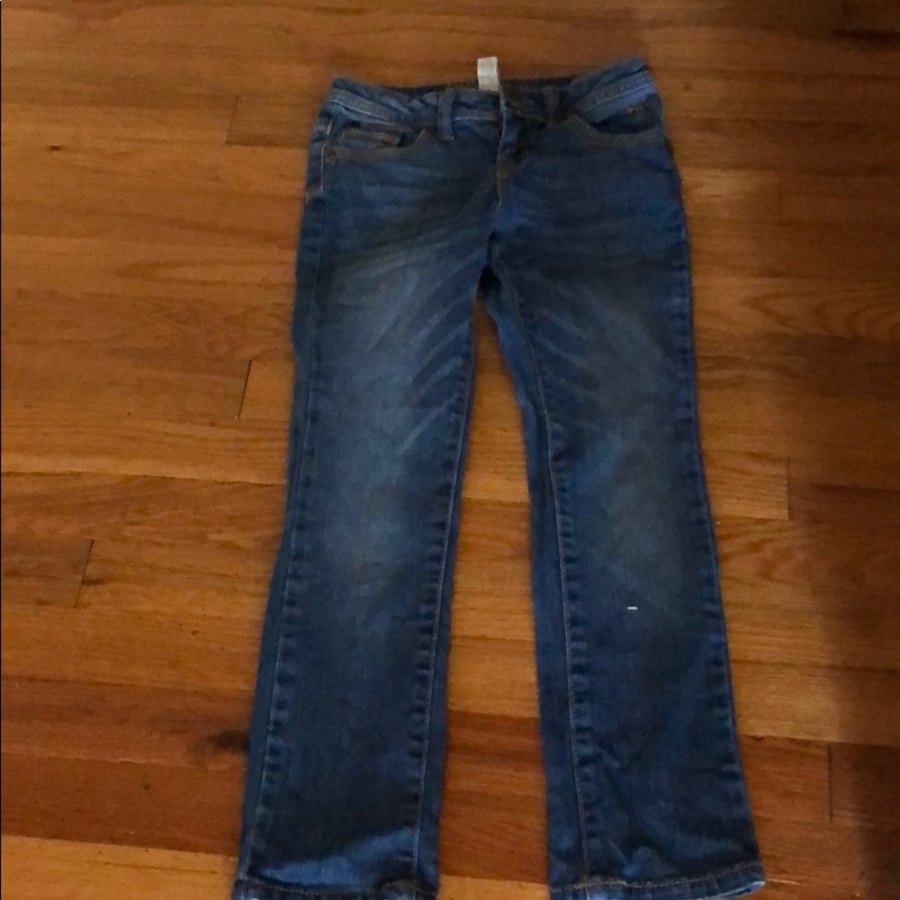 A pair of blue denim jeans.